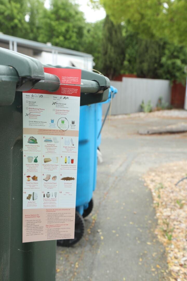 Contamination tag left on a compost cart